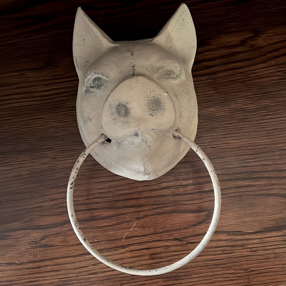 Cast iron, painted pale beige, Pig towel holder